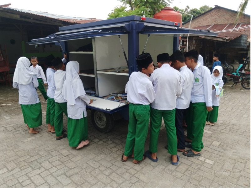 Kegiatan Perpustakaan Keliling di Madrasah Al Amien Ikrom Dusun III Tanggal 24 Februari 2026